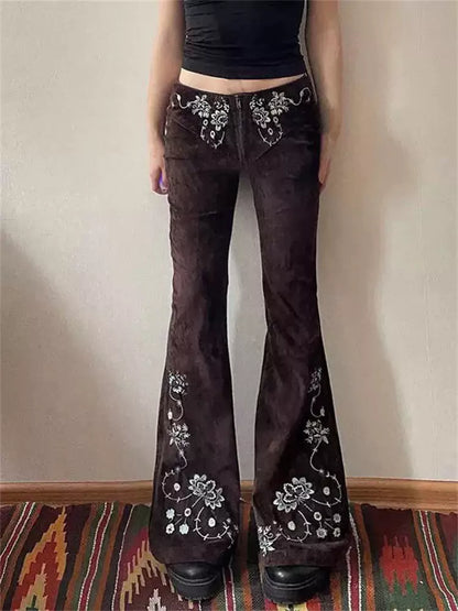 Vaqueros acampanados con bordados vintage para mujer