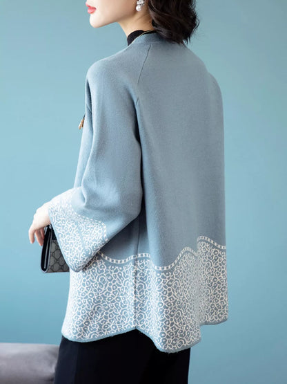 Elegante cárdigan de punto con cuello alto estampado azul para mujer