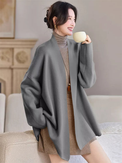 Elegante cárdigan largo de punto marrón para mujer