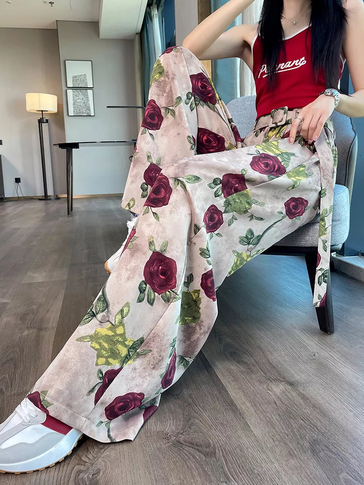 Pantalones anchos de cintura alta con estampado rosa para mujer 