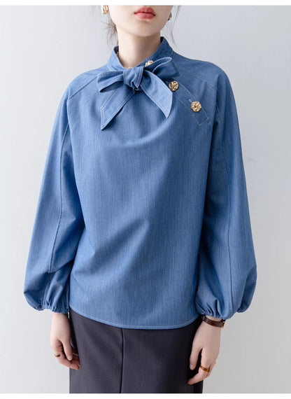 Damenbluse aus blauem Denim mit Schleife und Laternenärmeln