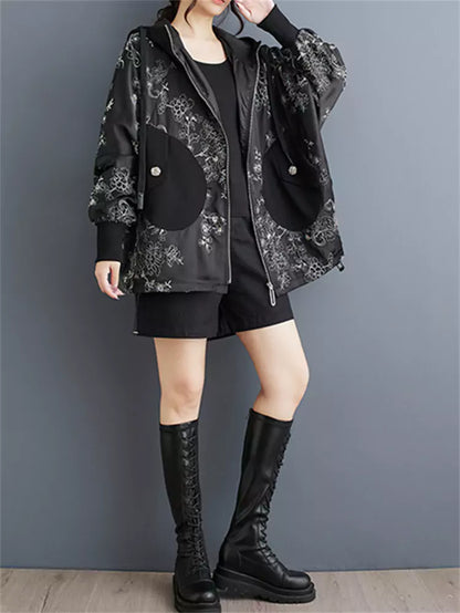 Stylischer Oversize-Kapuzenpullover mit Reißverschluss und aufwendiger Stickerei