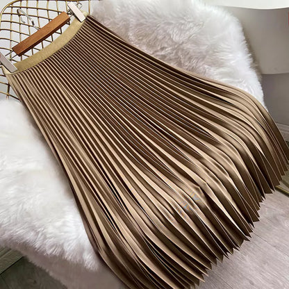 Eleganter, einfarbiger, hochtaillierter Faltenrock in Midi-Länge mit fließendem Fall