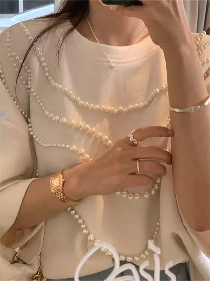 Aprikosenfarbenes, perlenbesetztes Kurzarm-T-Shirt für Damen