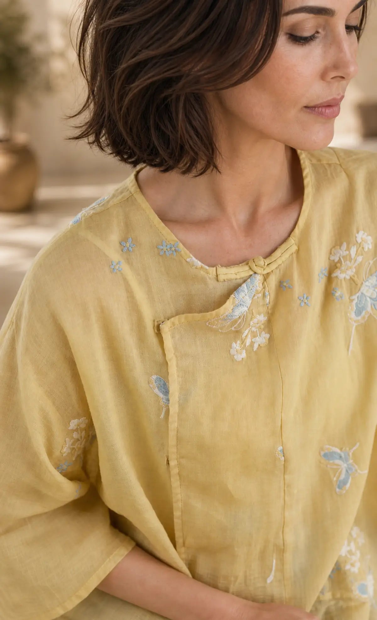 100% Ramie Top with Floral Embroidery & Knot Detail - lifestyle view