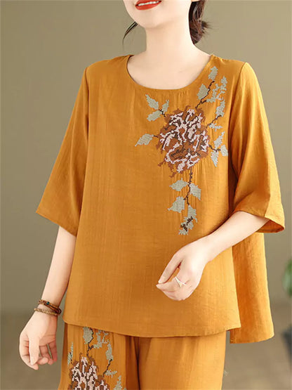 Conjunto de dos piezas de lino y algodón bordado vintage para mujer: blusa holgada y pantalones anchos.