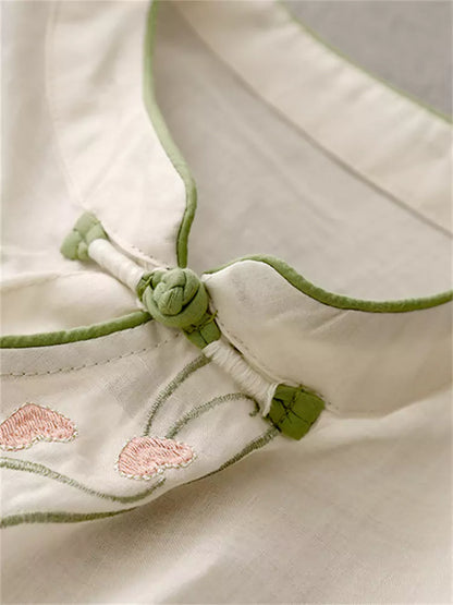 Vintage-Bluse aus Baumwoll-Leinen-Mischgewebe mit aprikosenfarbener, diagonal verlaufender Knopfleiste und Stickerei für Damen