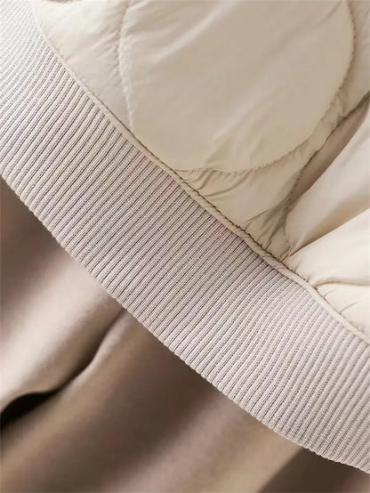 Khakifarbene Steppjacke mit Reißverschluss und Kapuze für Damen 