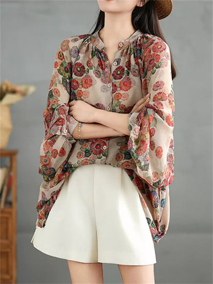 Leichte, langärmlige Bluse im Vintage-Stil mit Blumenmuster und Print.