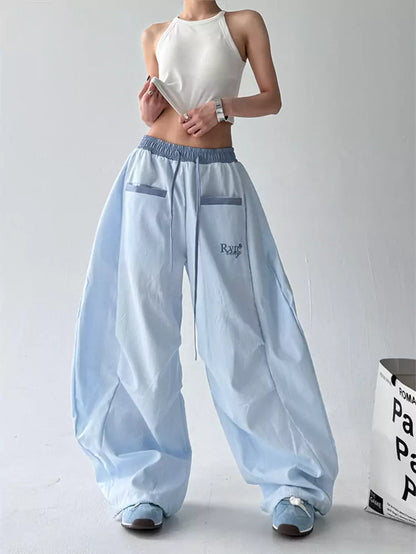 Pantalones holgados a rayas estilo urbano americano para mujer