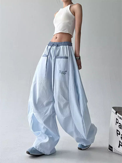 Pantalones holgados a rayas estilo urbano americano para mujer