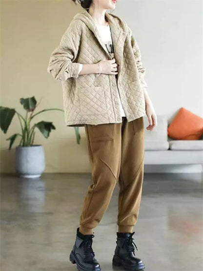 Orangefarbene, wattierte Baumwolljacke mit Kapuze für Damen