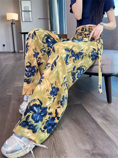 Pantalones anchos de cintura alta con estampado rosa para mujer 