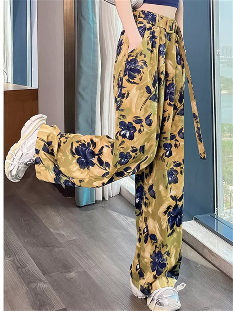 Pantalones anchos de cintura alta con estampado rosa para mujer 