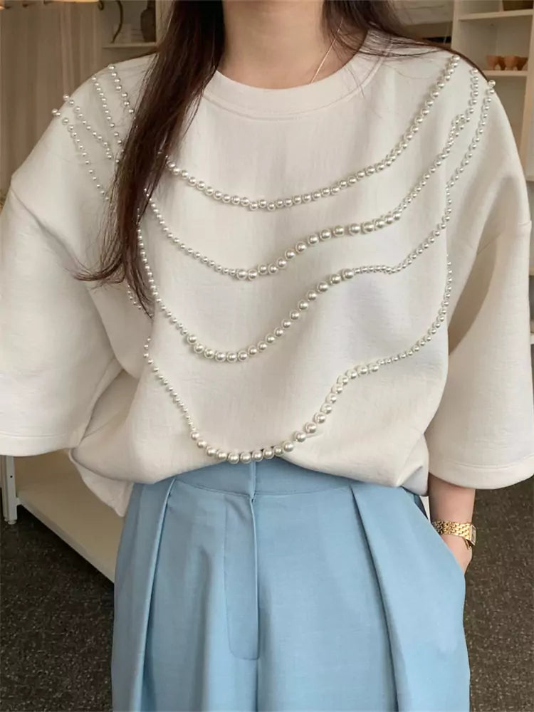 Aprikosenfarbenes, perlenbesetztes Kurzarm-T-Shirt für Damen