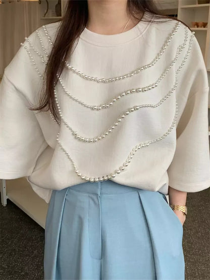 Aprikosenfarbenes, perlenbesetztes Kurzarm-T-Shirt für Damen