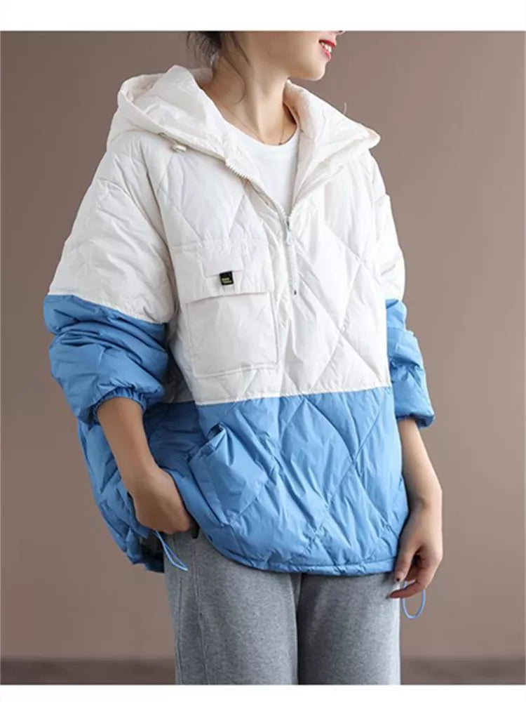 Locker geschnittene, graue Stepp-Daunenjacke mit Kapuze und Farbblockmuster für Damen