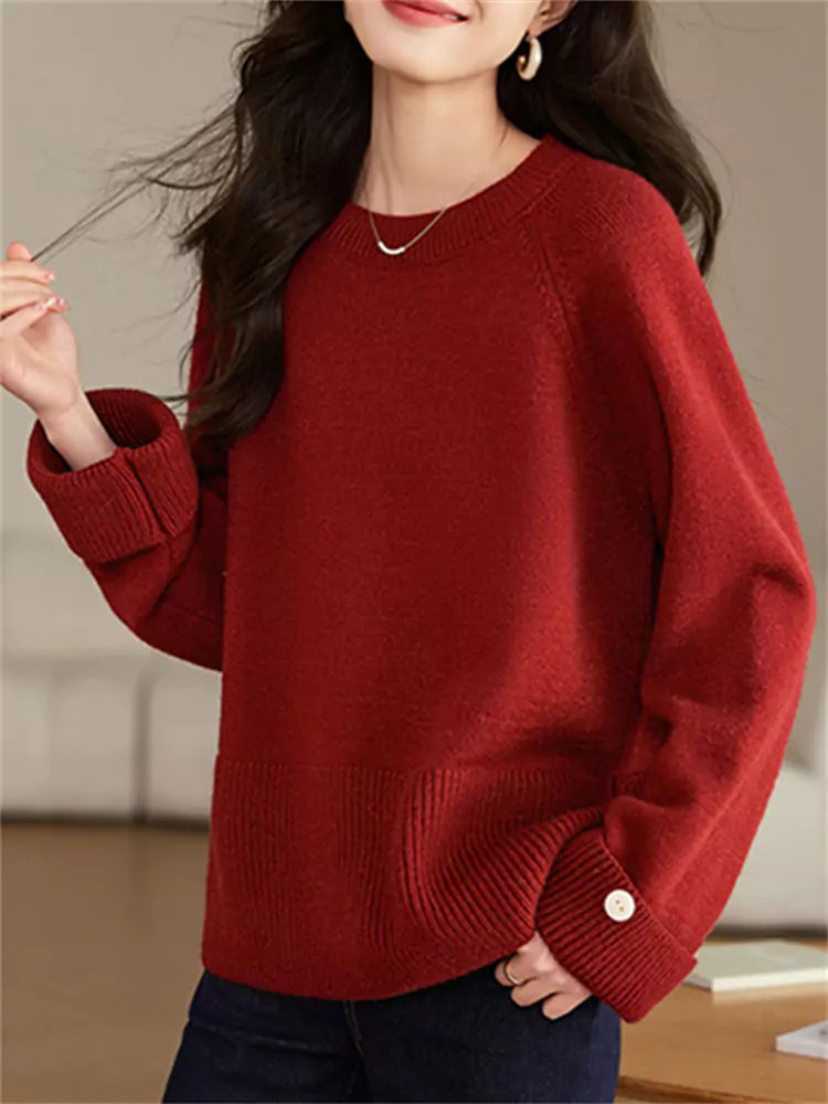 Mühelos eleganter, lockerer roter Strickpullover