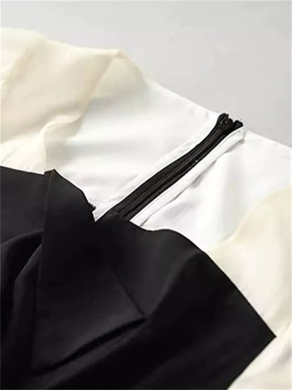 Französisches farbblockbesetztes, figurbetontes Chiffon-Midikleid mit Schlitz und kurzen Ärmeln