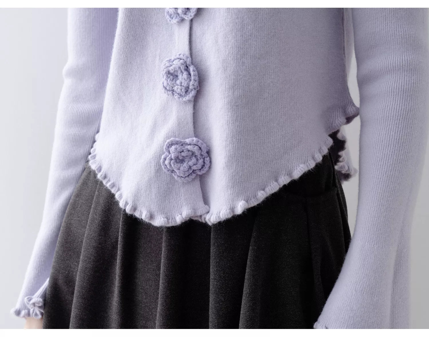 Elegant Purple Round Neck Knit Top with Floral & Ruffle Details