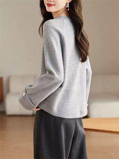 Suéter de punto rojo suelto, elegante y sin esfuerzo