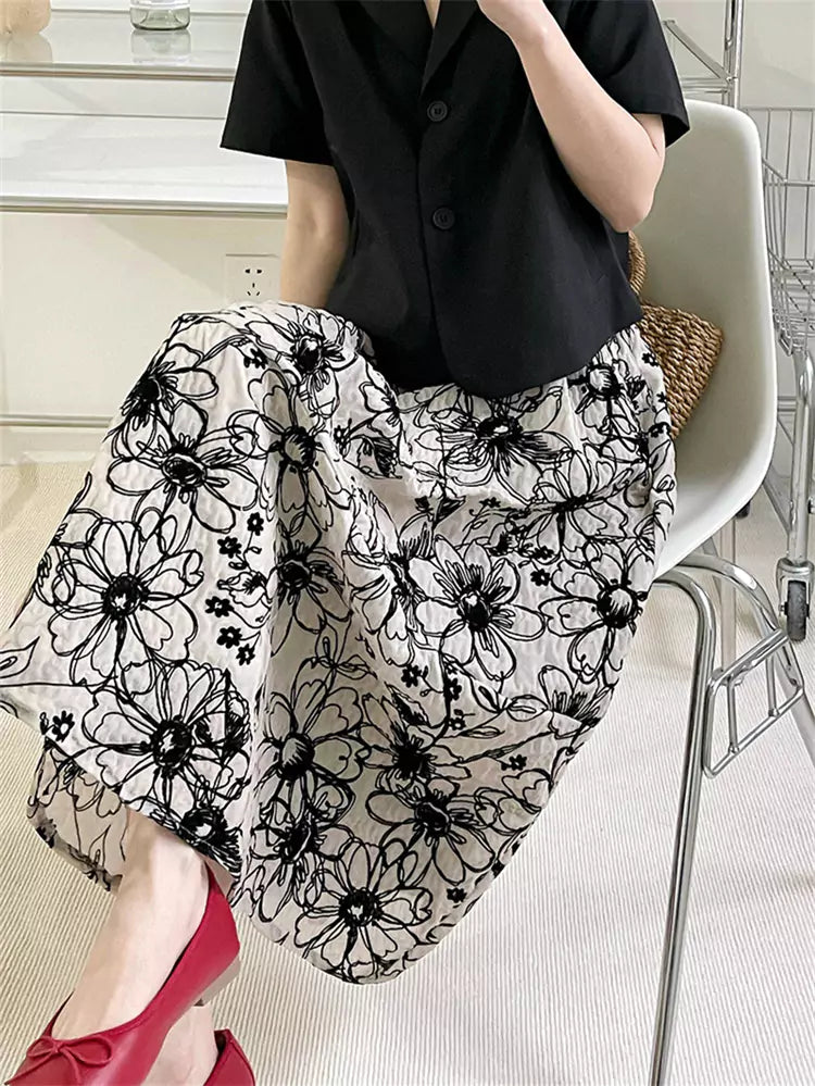 Falda midi francesa vintage artesanal de talle alto con flocado y corte A