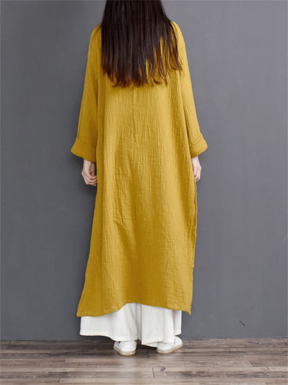 Gelbes Maxikleid im Vintage-Zen-Stil aus Baumwoll-Leinen für Damen mit Seitenschlitz, gekreuztem Kragen und Froschknöpfen