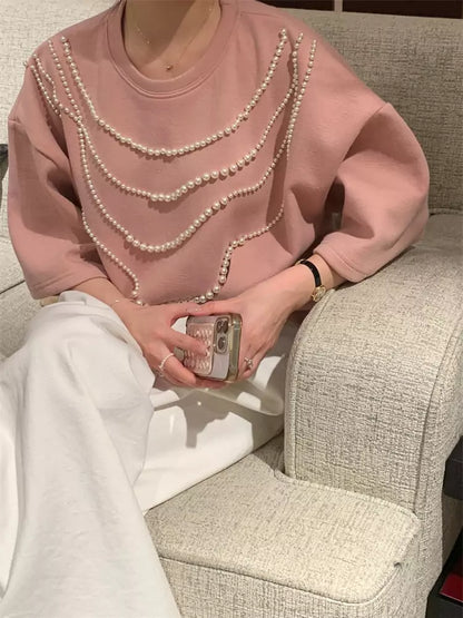 Aprikosenfarbenes, perlenbesetztes Kurzarm-T-Shirt für Damen