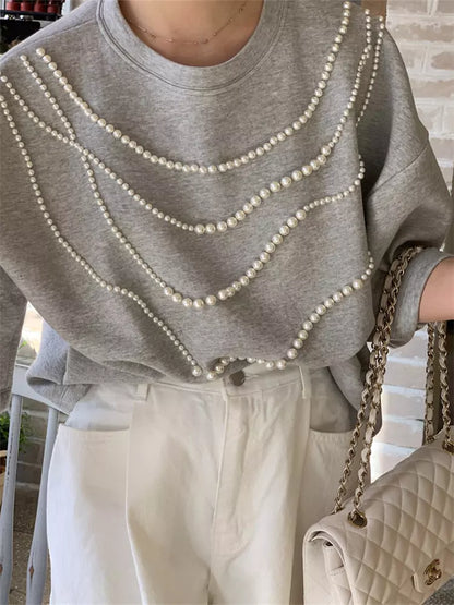 Aprikosenfarbenes, perlenbesetztes Kurzarm-T-Shirt für Damen