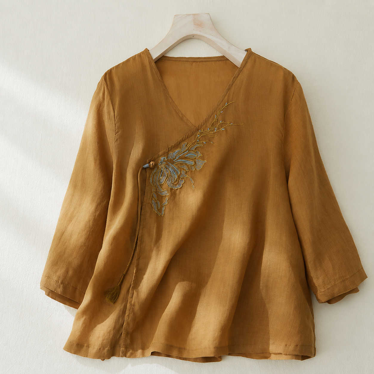 Embroidered V-Neck Top with Asymmetrical Tie Detail