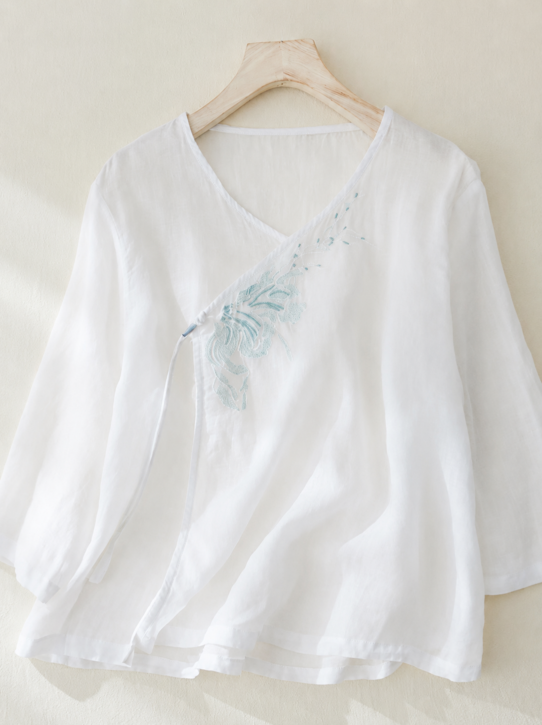 Embroidered V-Neck Top with Asymmetrical Tie Detail