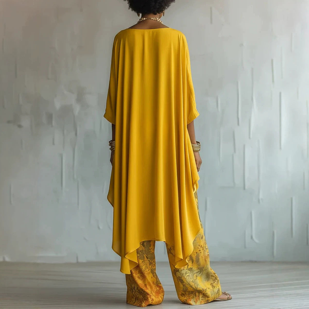 Relaxed Two-Piece Set with Asymmetrical Hem & Floral Pants