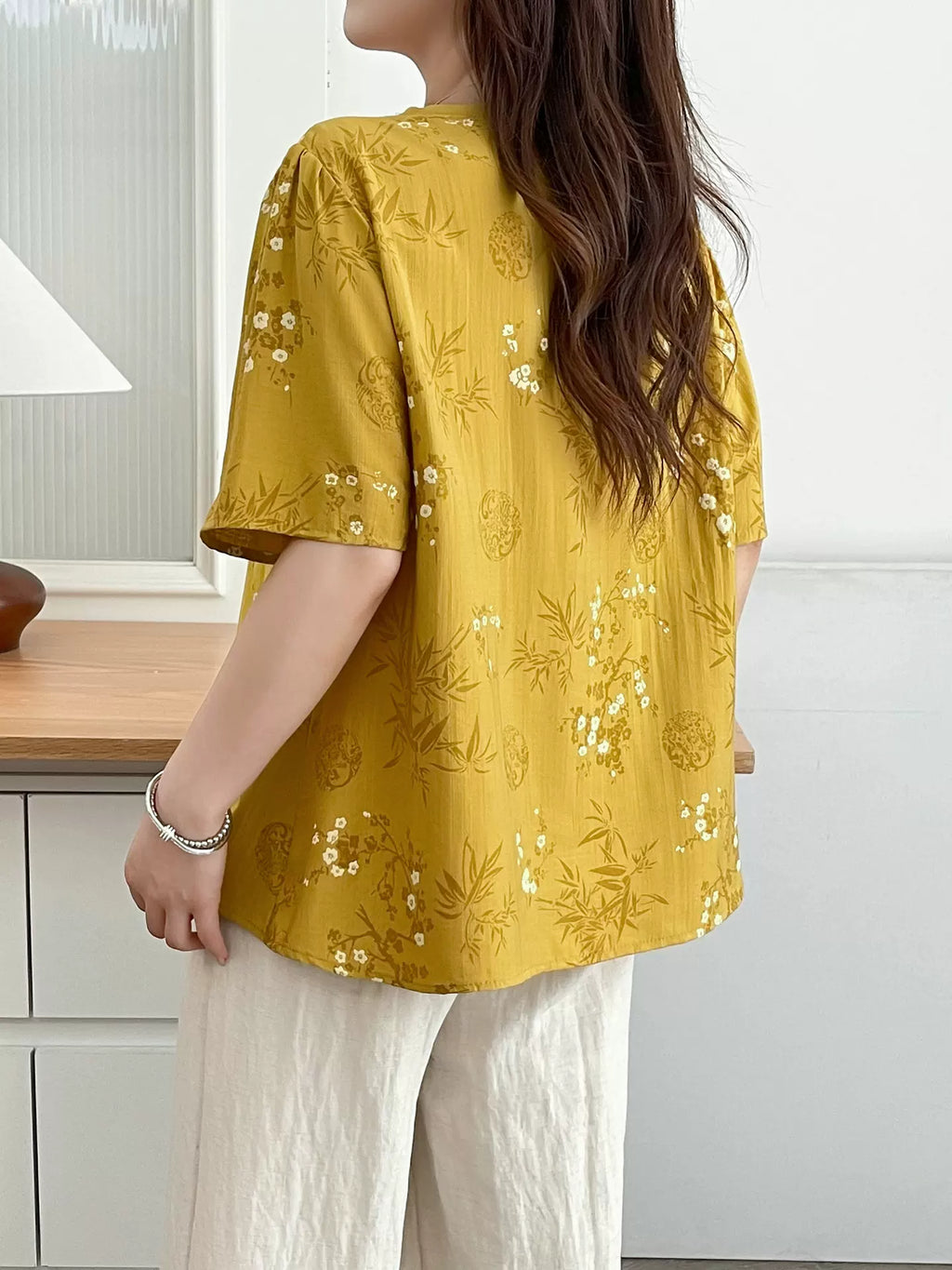 Relaxed V-Neck Tunic with Embroidered Trim & Botanical Print