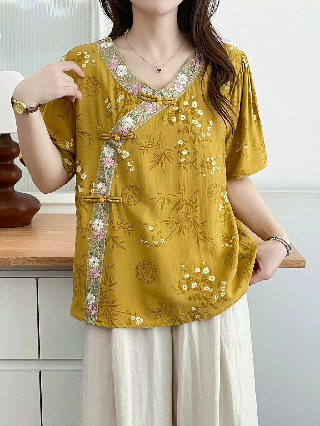Relaxed V-Neck Tunic with Embroidered Trim & Botanical Print