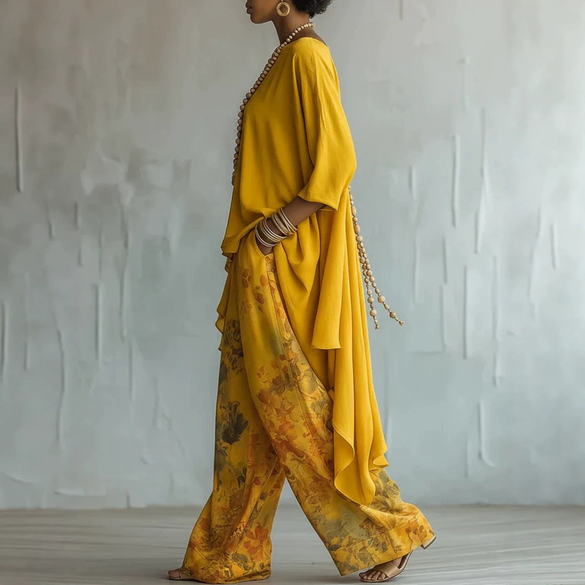 Relaxed Two-Piece Set with Asymmetrical Hem & Floral Pants