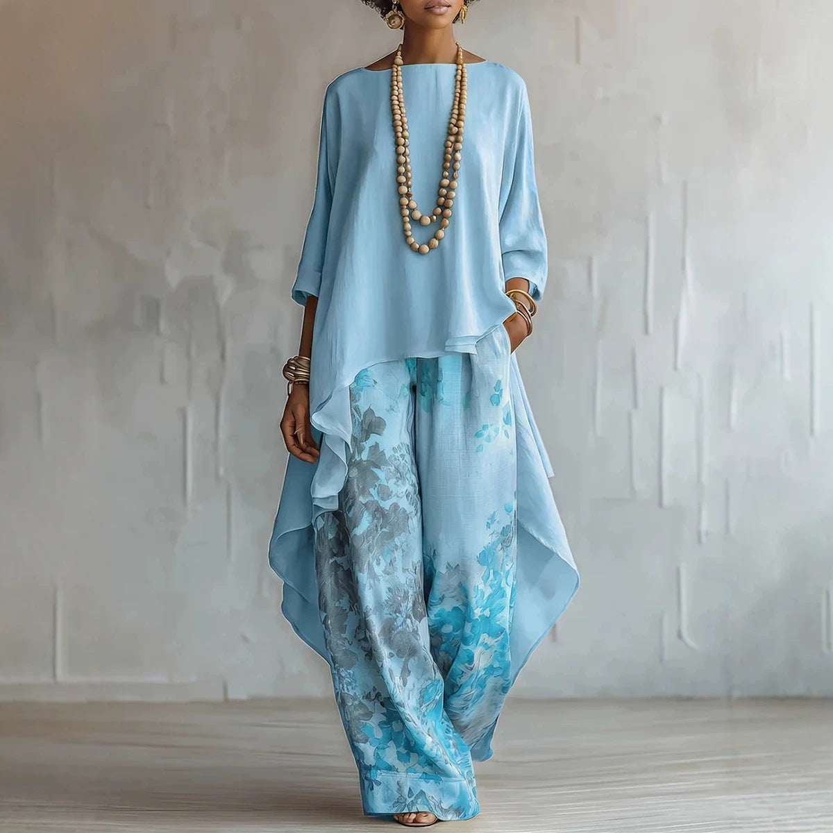 Relaxed Two-Piece Set with Asymmetrical Hem & Floral Pants