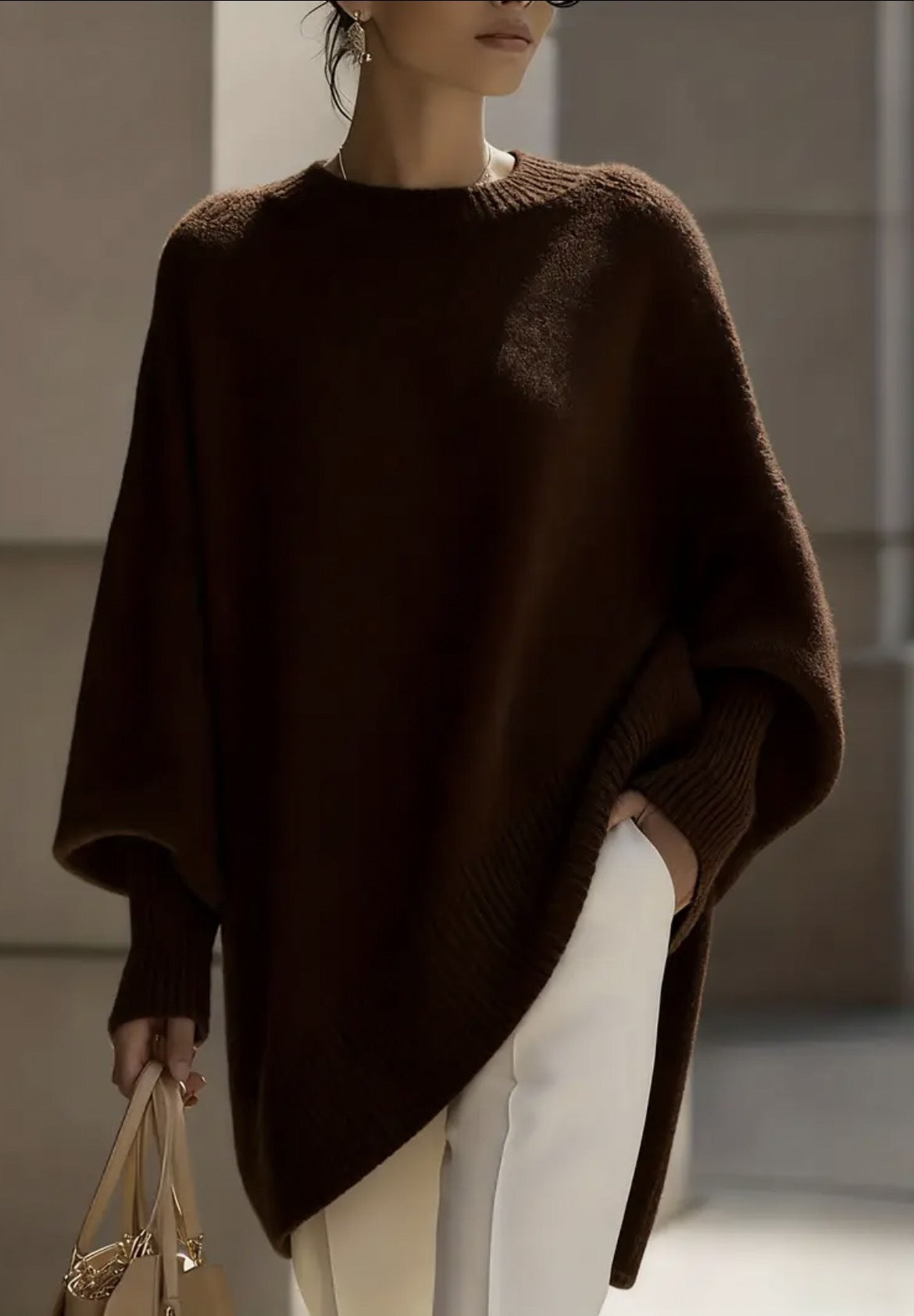 Oversized Knit Sweater with Asymmetrical Hem