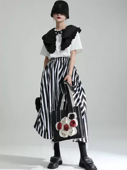 Asymmetrischer, mehrlagiger, plissierter Midirock mit 3D-Rosenapplikation