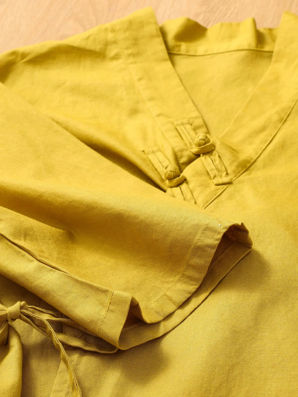 Asymmetrical Wrap Front Shirt with Tie Closure and Patch Pocket