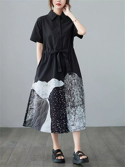 Schwarzes Hemdkleid mit Patchwork-Print und Bindegürtel