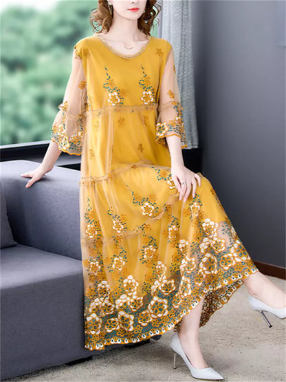 Vestido midi elegante de tul con bordado floral y cuello redondo