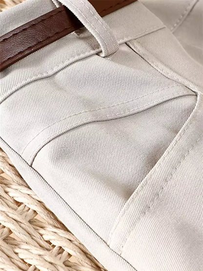 Klassischer Damen-Herbstanzug: Plissierter Midirock mit hohem Bund