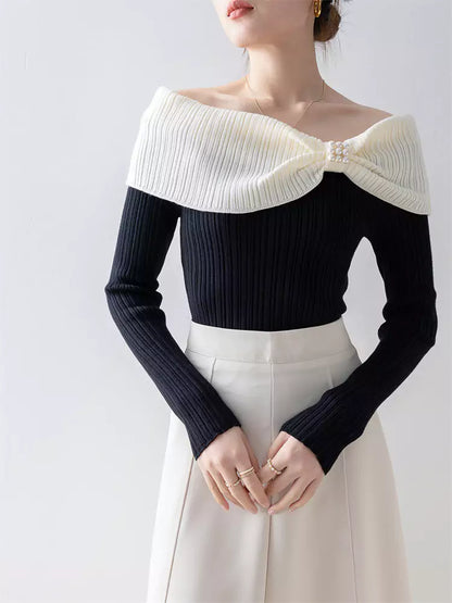 Kontrastfarbenes, schulterfreies, schmal geschnittenes Stricktop