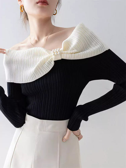 Kontrastfarbenes, schulterfreies, schmal geschnittenes Stricktop