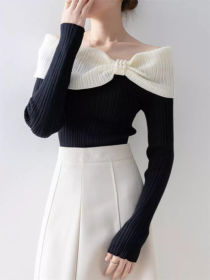 Kontrastfarbenes, schulterfreies, schmal geschnittenes Stricktop