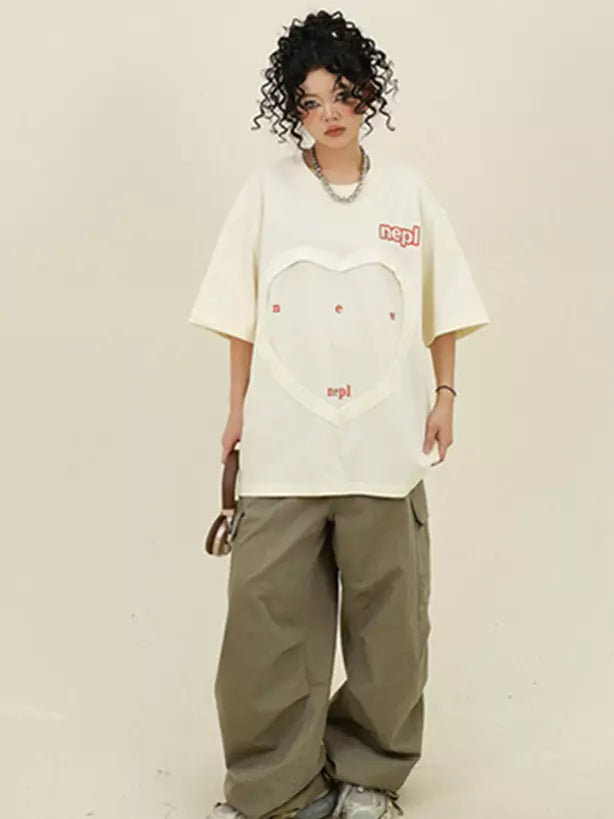 Bonita camiseta relajada de manga corta con patchwork de corazones