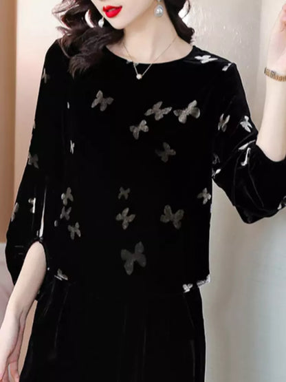 Elegante Samtbluse mit Laternenärmeln