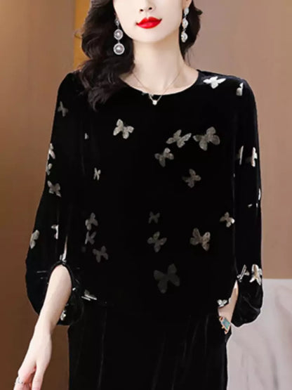 Elegante Samtbluse mit Laternenärmeln