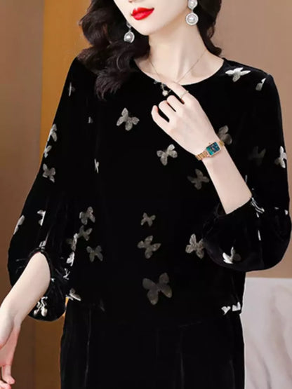 Elegante Samtbluse mit Laternenärmeln