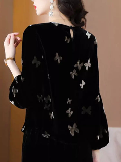 Elegante Samtbluse mit Laternenärmeln